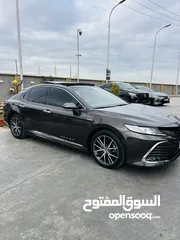  12 كامري قراندي بنوراما. Toyota Camry GLE Hybrid2021