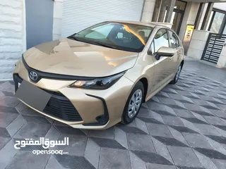  3 تويوتا كورولا 2021 لون شمباني بنزين اصلي ماتور cc1600 فحص كامل جمرك حديث