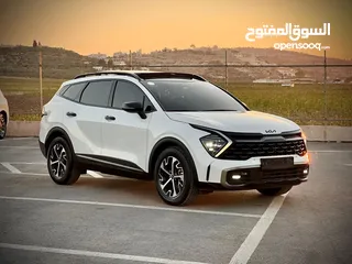  6 كايا سبورتاج /2022 فل الفل فتحة سقف  2x4 ///240Hp بنزين + كهرباء  ( Haybrid) 1600cc