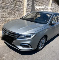  1 سيارة MG 5، لون سلڤر، فحص كامل، وارد الشركة، كفالة الشركة، بنزين اقتصادية جدا