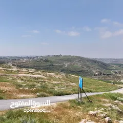  14 ارض للبيع 940 م تنظيم سكن ( أ )  تقع على شارعين طريق المطار_  ناعور حسبان _ من المالك مباشرة
