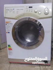  1 غسالة وايت ويل الباب الكبير بحالة ممتازه