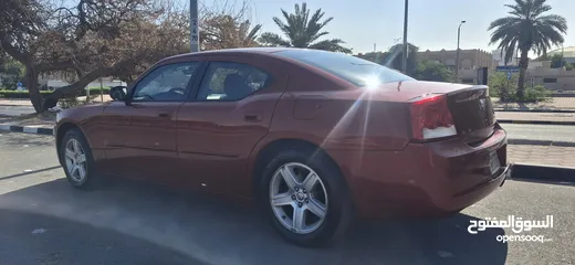  14 2 Dodge Charger v6.2010. Both Good Condition. Neat and Clean. Red 190k km.White 240k km..