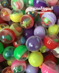  25 ماكينات مصاص و علكة وطابات هدايا و هزازات بالعملة