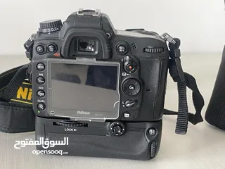  2 كاميرا نيكون d7000 مع عدسة سيجما 70-300