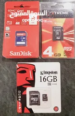  2 كروت ذاكرة و فلاشات ميموريMicroSd Cards with and without adapter Kingston - SanDisk - Toshiba - Inte