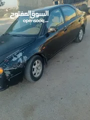  6 كيا تشوما موديل 1999