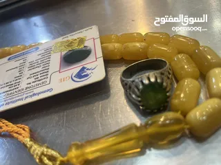  1 خاتم زمرد مع مسبحه كهرمان