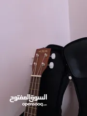  7 ukulele kala ka-15s يوكيليلي اصلي جديد مع الشنتة نوعية ممتازة جدا اوتار اصلية جديدة نوعية نضيفة