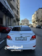  5 هونداي اكسنت 2015 محرك 1600 ديزل لون ابيض فرش جلد تشغيل بصمه حساسات خلفيه كاميرا خلفيه ترخيص وتامين