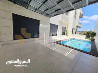  4 شقق ارضية مع مسبح و حديقة للبيع في رجم عميش بمساحة بناء240م