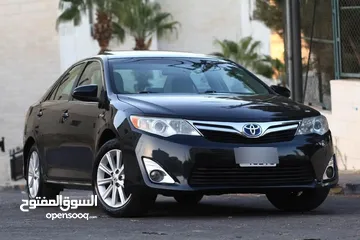  2 تويوتا كامري لون كحلي مميز موديل 2014 للبيع بحالة مممتازة لا تحتاج لأي نوع من الصيانة