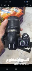  1 كاميرا نيكون D3100