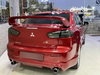  12 ميتسوبيشي لانسر موديل 2015 GT اصلي فحص كامل بحالة الوكاله فل كامل اعلى صنف من فئتها