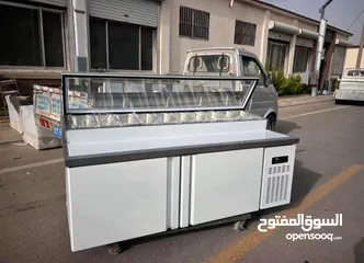  1 تلاجة بيتزا جديده