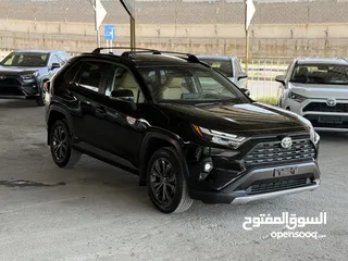  4 تويوتا راف فور ((2023)) XLE بريميوم، بطارية ليثيوم، فحص كامل، فل كامل، فورويل، حره، بسعر مميز..