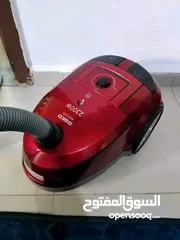  1 مكنسة كهربائية لون خمري