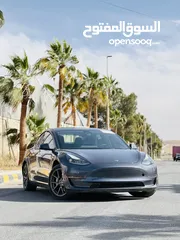  1 Tesla model 3 /2022 standard plus تيسلا موديل 3 لون فيراني داخلية اسود