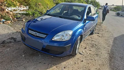  4 كيا برايد 2009 اوتومات 4+1 بنزين اصل خصوصي 1600 مع فتحة سقف اصلية