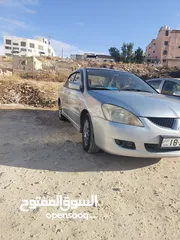  14 لانسر 2005 وارد الكويت 4 جيد ماتور 1600 الاصلي "الملا"