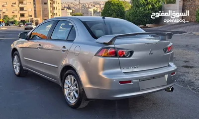  5 ميتسوبيشي لانسر 2016 فحص كامل اتوماتيك للبيع كاش او اقساط دفعة اولى 3500 من المالك مباشرة بدون بنوك