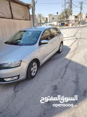  1 سيارة سكودا رابيد 2014