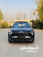  3 كيا سبورتاج هايبرد 2023 فل كامل مع بانوراما - باللون المميز والداخلية المميزة - والسعر المميز