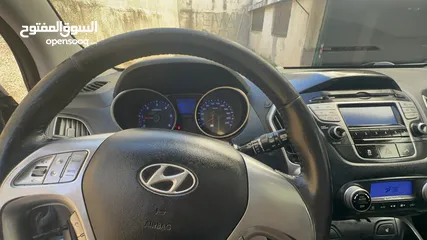 20 2009 ‏Hyundai توسان LX20 اربع ابواب، اللون فيراني، الكراسي جلد والسيارة 92,000 كيلو فقط وبحالة رائعة