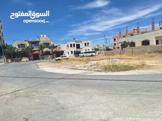  2 ارض سكني المستنده خلف المستندخ مول منطقةمميزة علي 3شوارع