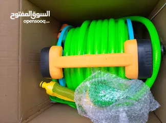  4 بكرة مع بربيش ماء مع رشاش لضخ الماء جديد