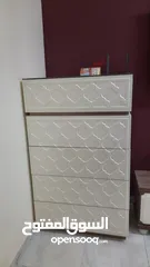  1 CHEST OF DRAWERS,USED IN THE LIVING ROOM