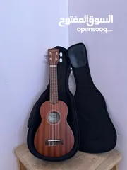  1 ukulele kala ka-15s يوكيليلي اصلي جديد مع الشنتة نوعية ممتازة جدا اوتار اصلية جديدة نوعية نضيفة