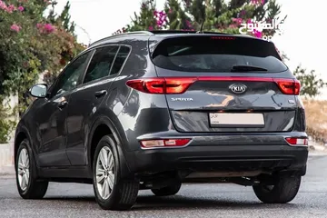  4 Kia Sportage 2018  السيارة وارد و بحالة الوكالة   محرك :  1600 سي سي 4 سلندر  بنزين   اللون : كحلي م