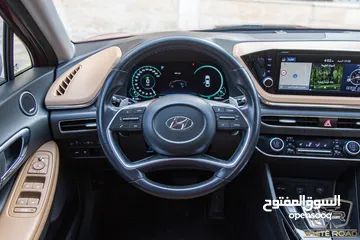 13 Hyundai Sonata 2021 Hybrid  السيارة وارد و صيانة الشركة و قطعت مسافة 125,000 كم فقط