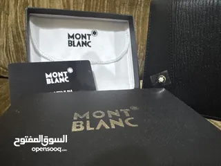  11 محفظة رجالي ماركةً (مونت بلاك )اصلية جديدة تحتوي على جميع اغراضها