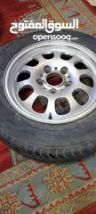  11 طقم جنط مع كوتش مقاس 15