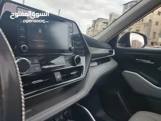  2 تويوتا هايلاندر 2021 فحص 2 جيد فل الفل بفتحه لون ابيض لؤلؤي بسعر مغري قابل للبدل