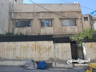  15 عمارة مكونه من طابقين وساحه خارجيه للبيع