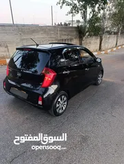  3 كيا مورننغ مع فتحة سقف وبصمة