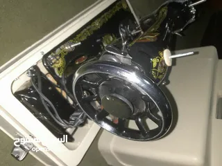  1 مكينه خياطة سنجر