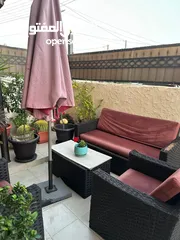  1 طقم راتان ومظلة ومرجيحة