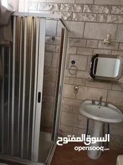  8 استديو غرفة وصالون في ضاحية الرشيد للايجار 170دينار شامل ماء وكهرباء وحارس