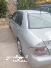  5 متسوبيشي لانسر موديل 2010