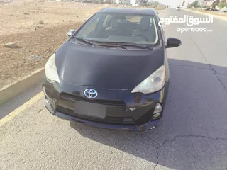  1 تويوتا بريوس سي موديل 2013 لون أسود بحالة جيده ترخيص جديد فحص مرفق السعر 6000 قابل للتفاوض للجادين