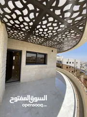  11 شقة طابق اخير مع روف 230 متر وتراس 100 متر على شارعين  طريق المطار خلف المدارس العالمية بسعر مميز