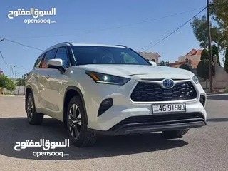 5 تويوتا هايلاندر 2021 فحص 2 جيد فل الفل بفتحه لون ابيض لؤلؤي بسعر مغري قابل للبدل