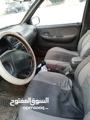  8 كيا سبورتج 2001 لون اسود للبيع