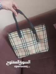  2 authentic burberry handbag used quite a few time