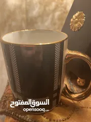  7 كوب (مج) اخضر الون يده ذهبية وجميل جدا ثقيل الحجم