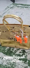  1 شنطة يد هيرمس ذهبى موديل جديد New model gold herme`s paris handbag